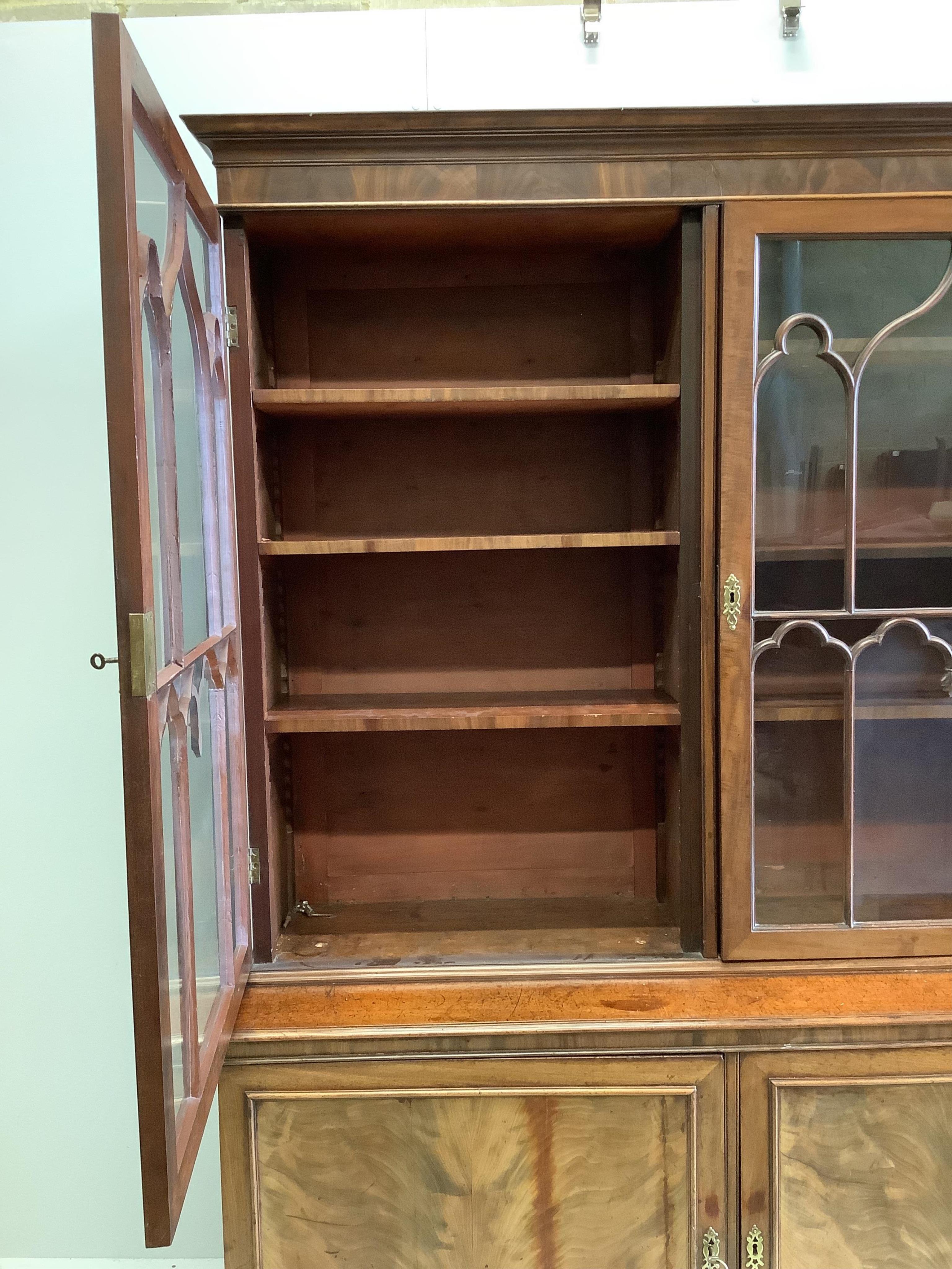 A George III mahogany bookcase, width 152cm, depth 47cm, height 203cm. Condition - fair to good